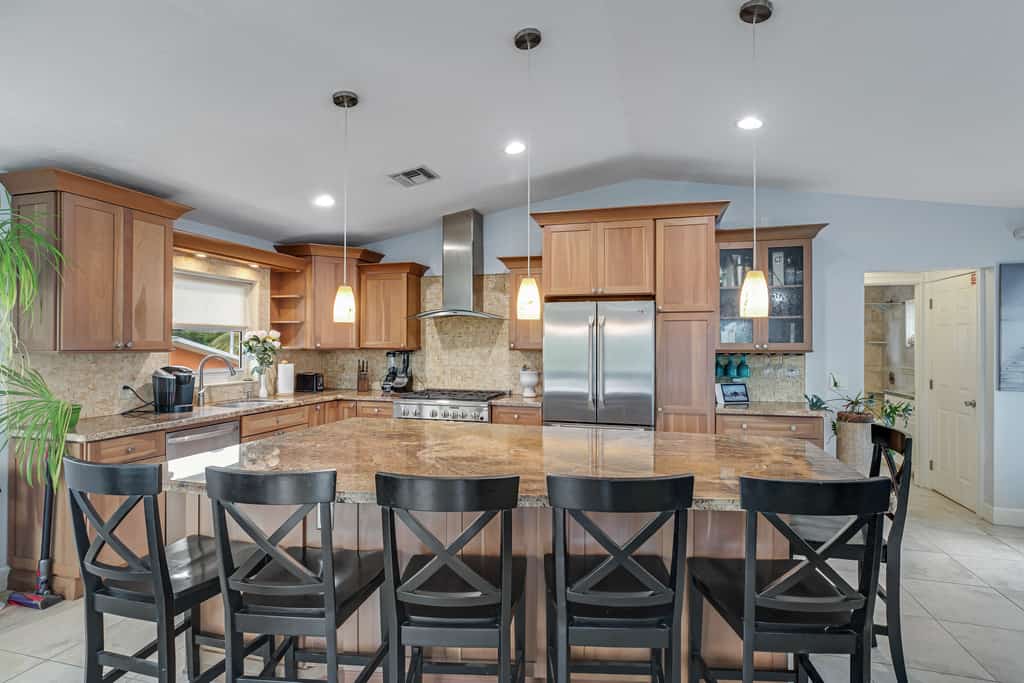 Waterfront hideaway with dock, pool & inviting patio - walk to Sombrero Beach