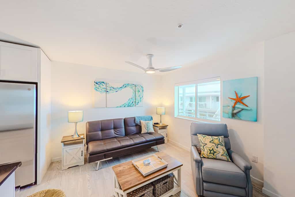 Snowbird-friendly sound view condo with open layout, patio, W/D, & AC