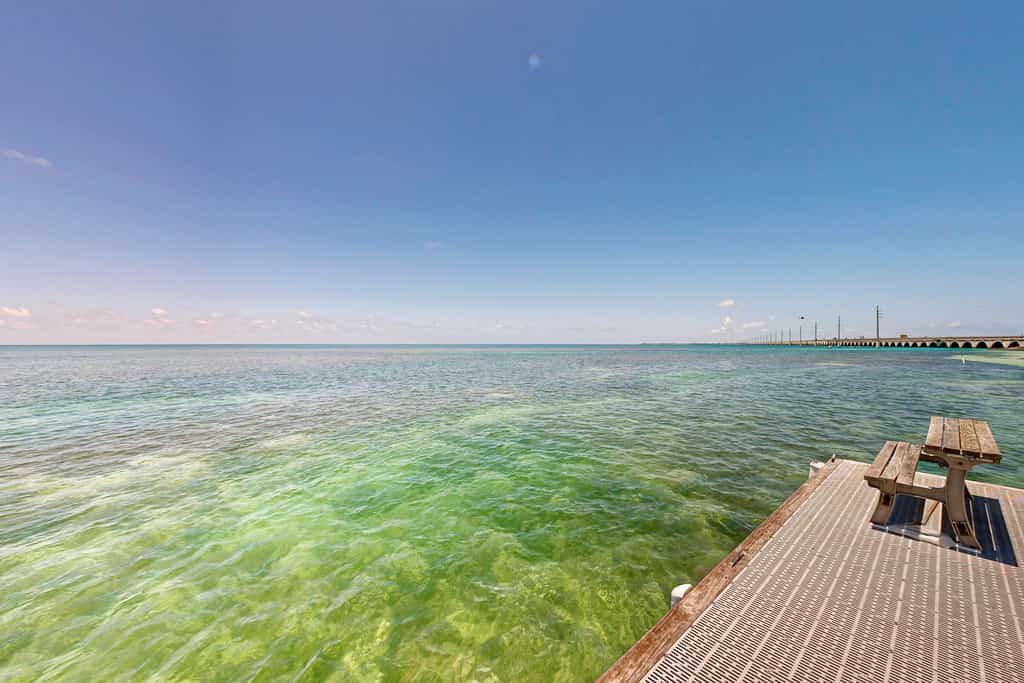 Historically located condo w/ocean views, pool, loft, AC & guest boat access