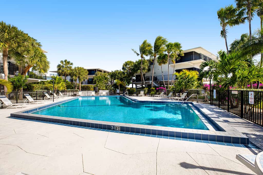 Second Floor Condo with Shared Pool, Shared Dock, Central AC, and WiFi
