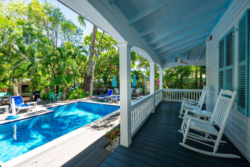 Multi-home tropical paradise with large, heated pool, & wraparound sundeck
