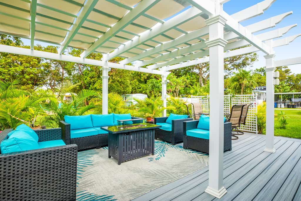 Inviting home near the water with gazebo, fire table, and heated spa