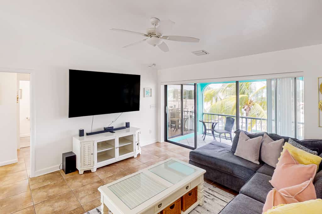 Waterfront home with boat/canal access, screened lanai, & renovated interior