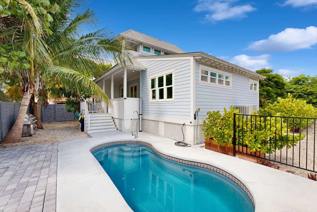 Florida Keys style waterfront home w/ private pool, modern decor and prime location