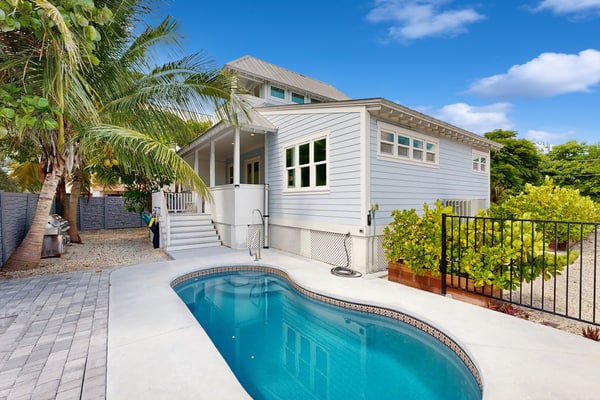 Florida Keys style waterfront home w/ private pool, modern decor and prime location