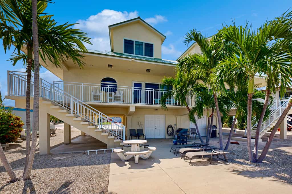 Waterfront home with 35-foot dock, Cabana Club membership with pool/beach access