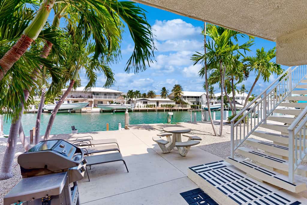 Waterfront home with 35-foot dock, Cabana Club membership with pool/beach access