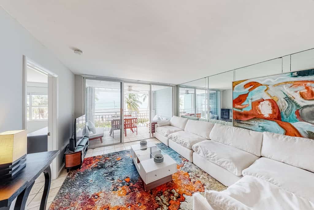 Colorful waterfront condo with pool & hot tub, AC, W/D, & WiFi - dogs OK