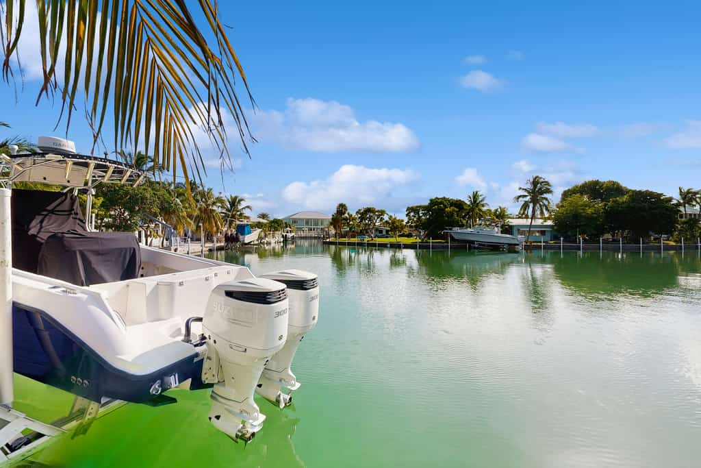 Quiet, spacious canal-side home with private pool, waterfront patio & central AC