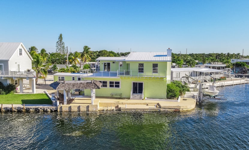 Canal Front Gem W/ Private Dock, PS4, Free WiFi, & Expansive Balcony W/ Views