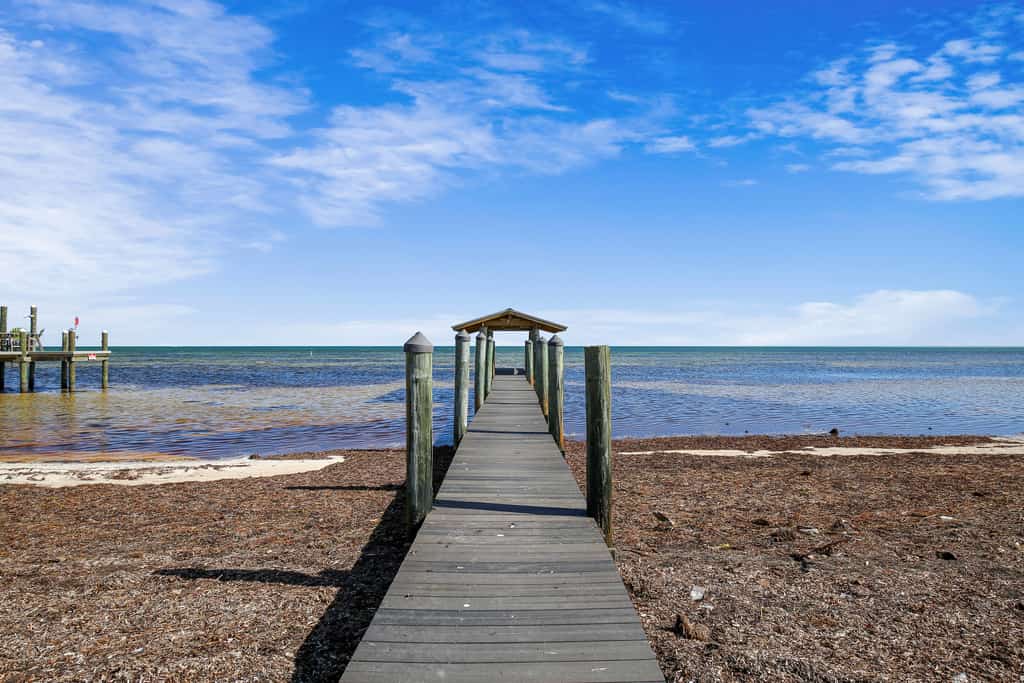 Family-friendly oceanfront home with private beach, private gas grill, and deck
