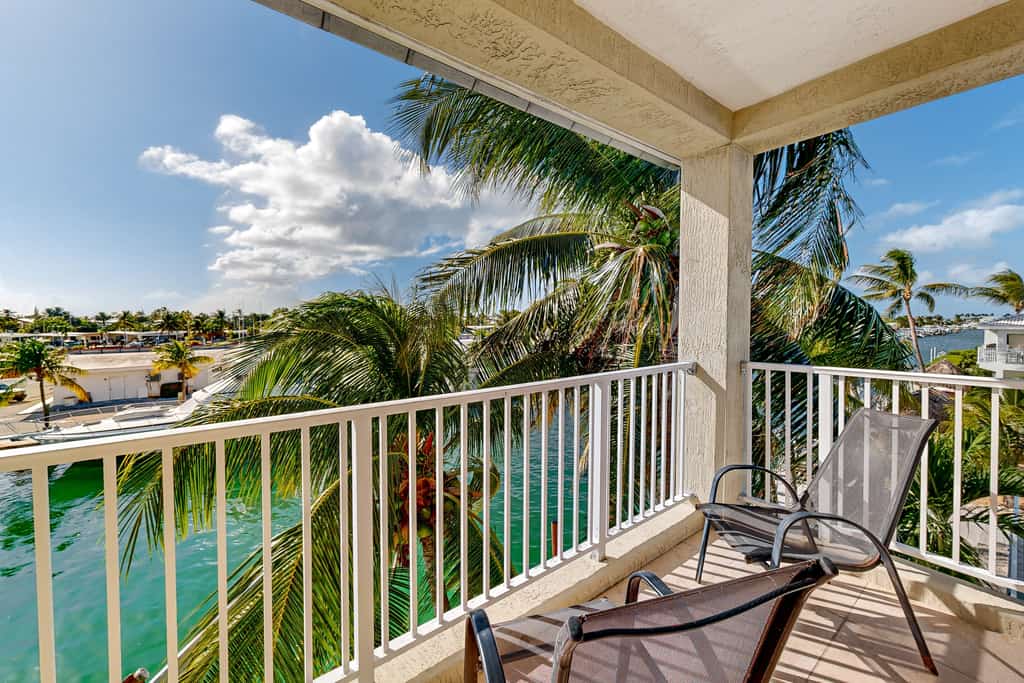 Waterfront Half-Duplex with 30-Ft. Dock, Sitting Pool, and Private Beach Access