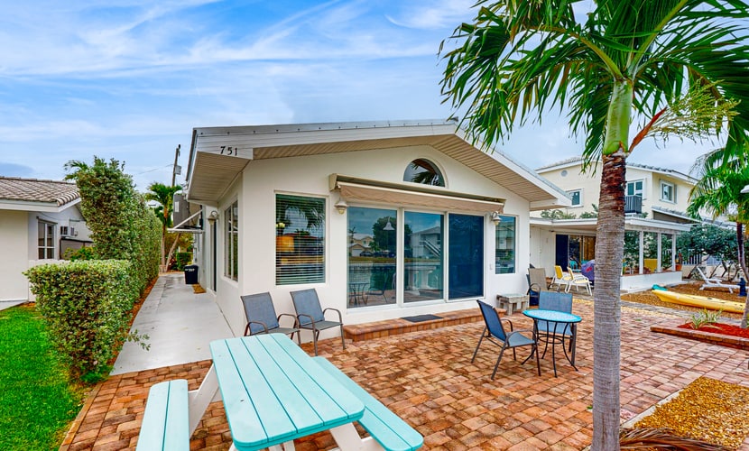 Waterfront Home with 35-Foot Dock and Access to Private Beach and Shared Pool