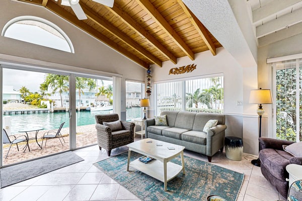 Waterfront Home with 35-Foot Dock and Access to Private Beach and Shared Pool