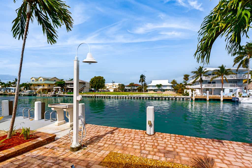 Waterfront Home with 35-Foot Dock and Access to Private Beach and Shared Pool