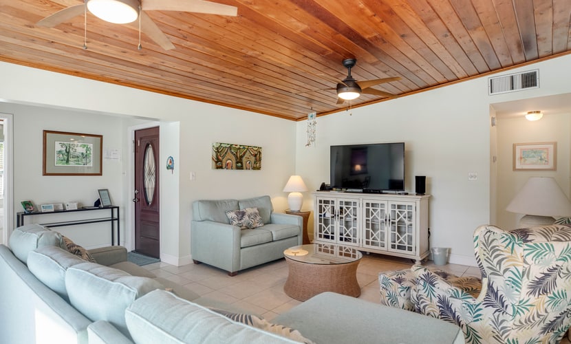 Deluxe canal-front home with pool, water-view patio, grill, & Cabana Club access