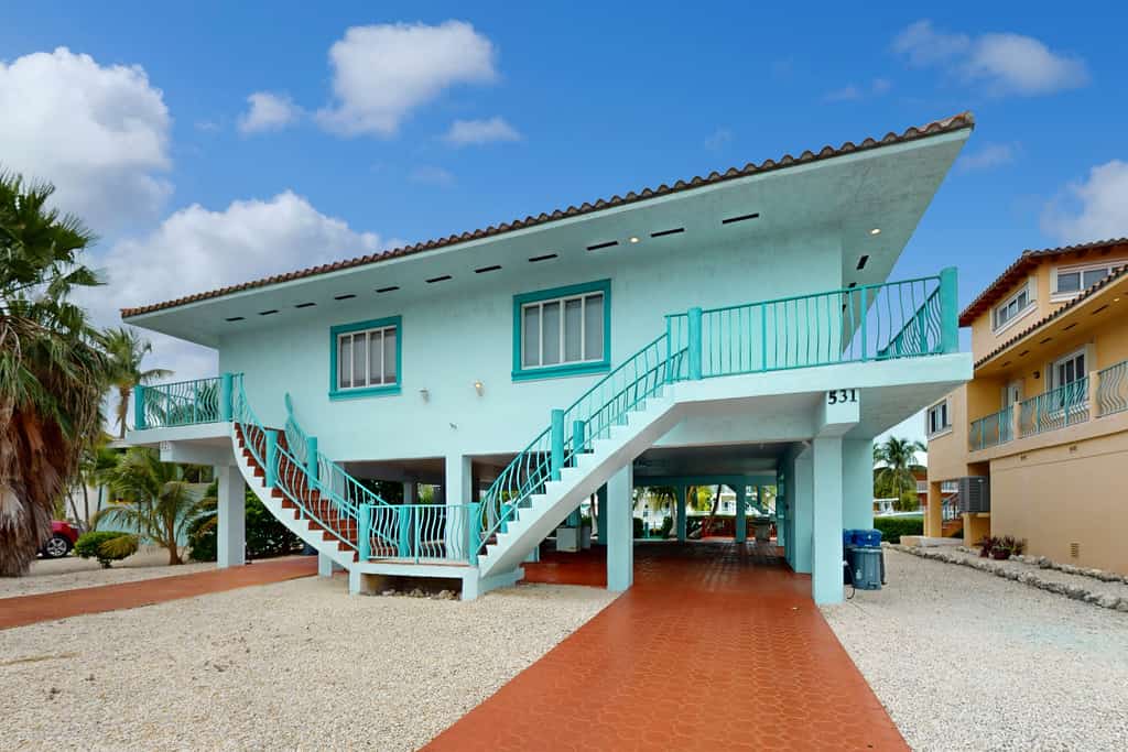 Waterfront Home with 35-Foot Dock, Bay Views, WiFi, and Shared Pool and Beach