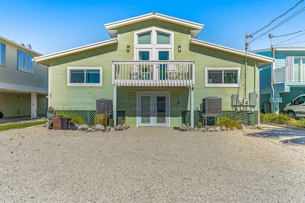 Enchanting dog-friendly waterfront retreat with pool, hot tub, & amazing views