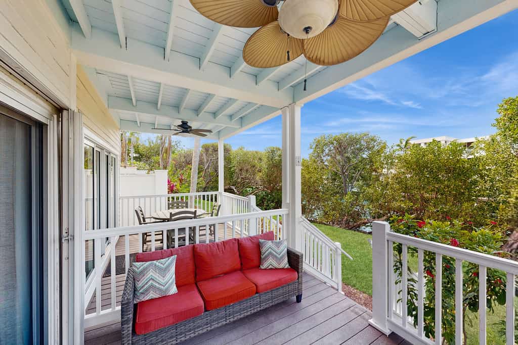 Charming townhome with ocean views, an open porch & steps from the water