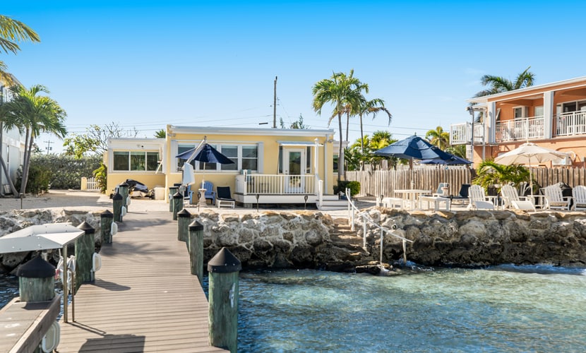 Waterfront beauty with a dock, small private beach, washer/dryer, & gas grill