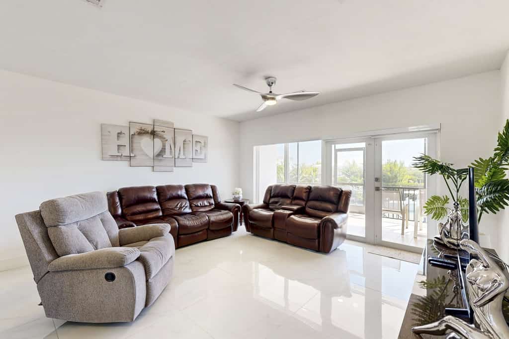 Serene retreat with private dock, pool, washer/dryer, & canal access