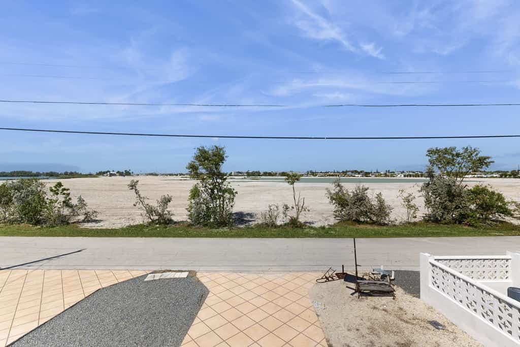 Serene retreat with private dock, pool, washer/dryer, & canal access