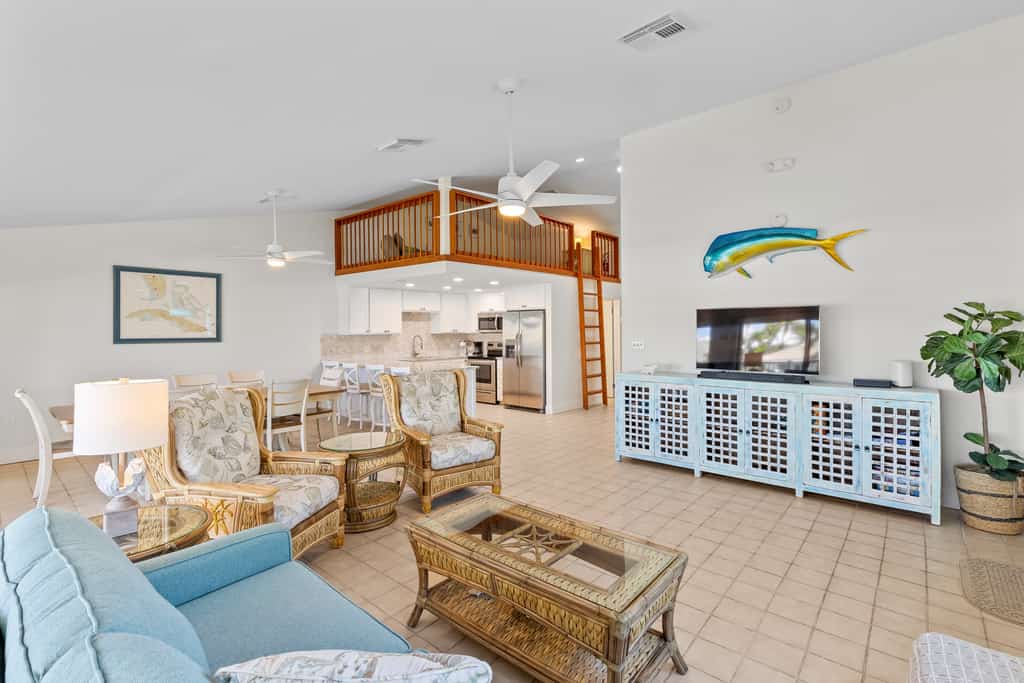 Waterfront duplex with hot tub, pool, & beach access - W/D, balcony, and grill