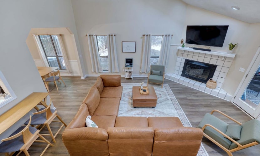 Welcome to our open-concept home! Inside, enjoy a spacious layout featuring cozy seating in the living area and dining space. Set the mood with our vintage record player or have movie nights on the large flat-screen TV, with additional TVs in every bedroom. Step onto the screened-in patio with comfortable furniture and a grill for outdoor meals. For convenience, we offer a dishwasher, washer/dryer, and amenities for families, including a Pack 'n Play(available upon request). Enjoy your stay!