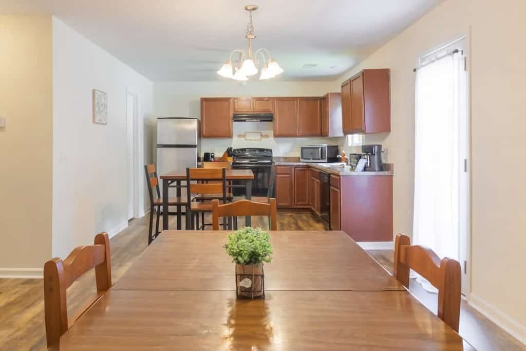 This brand new 4-bedroom/2.5-bathroom home offers an open-concept living space downstairs with a fully-equipped kitchen, dining room, living room, and half bath! The 4 bedrooms and 2 full bathrooms are upstairs. Only 10 minutes to Fort Benning (Moore) and 15 minutes to downtown Columbus! Onsite laundry, off street parking, free wifi, and pets are welcome with a fee! We would love to host you!