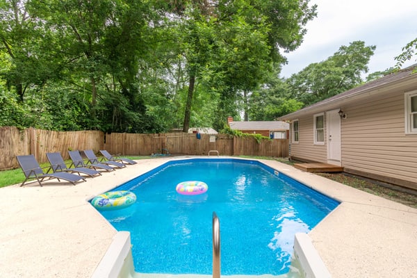 Welcome to this beautiful home in North Columbus! With 4 bedrooms and 3 bathrooms, it comfortably accommodates up to 14 guests. Our spacious kitchen is fully equipped for your cooking needs, and you can enjoy entertainment with a Smart TV and free Wi-Fi. Relax on the back patio or take a dip in the calming swimming pool—your sanctuary away from the hustle and bustle! Book with us; we’d love to host you!