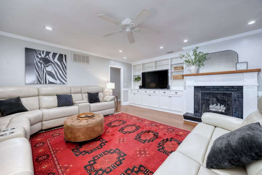 Discover this stunning home on a corner lot in a serene, safe neighborhood. Just minutes from local amenities, it boasts a lovely community park and stream right across the street. Enjoy a pool and hot tub, plus a gourmet kitchen featuring double ovens and a 5-burner induction cooktop. The family room is equipped with a big-screen TV and sound bar, while a separate living room also includes its own large-screen TV. With two king suites and all bedrooms featuring TVs, the back bedroom offers versatile use as an office. Your dream home awaits!