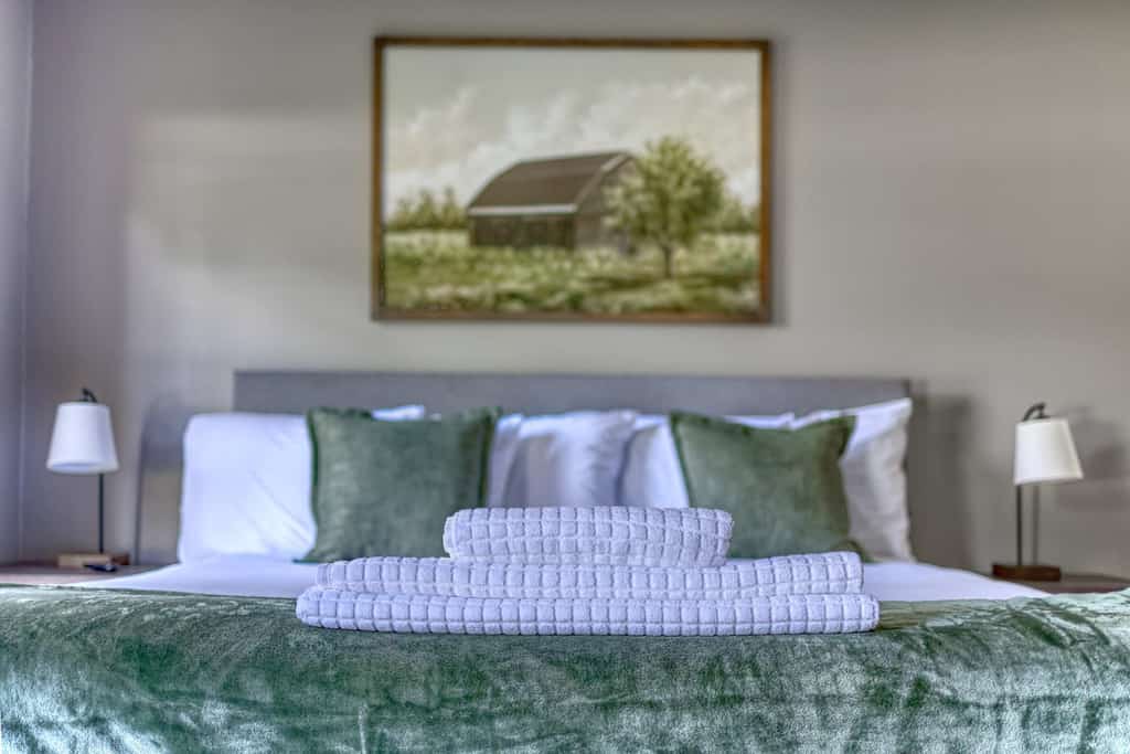 Our beautiful ranch-style home features three bedrooms and two bathrooms and sleeps up to 10. Enjoy a fully-equipped kitchen, spacious living area, a fenced backyard, an in-ground pool, and a covered patio with a TV, grill, and seating. Thoughtfully designed with comfort and style in mind, it’s the perfect place to relax and gather with loved ones. Pets are welcome with a fee. We’d love to host you!