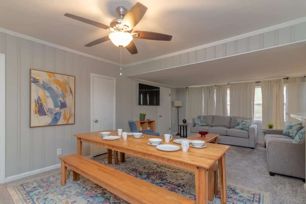 Step inside to discover a perfect blend of classic charm and modern comfort. The thoughtful layout maximizes functionality, offering ample space to live, work, and relax. With 4 bedrooms, 2 bathrooms, and room for 14 guests, this spacious rental is ideal for families and pet-friendly with a fee. We provide both professional photos and real-time images from our cleaning team, ensuring transparency about what to expect. We’d love to host you—make yourself at home!