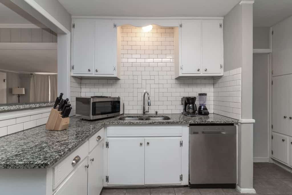 Step inside to discover a perfect blend of classic charm and modern comfort. The thoughtful layout maximizes functionality, offering ample space to live, work, and relax. With 4 bedrooms, 2 bathrooms, and room for 14 guests, this spacious rental is ideal for families and pet-friendly with a fee. We provide both professional photos and real-time images from our cleaning team, ensuring transparency about what to expect. We’d love to host you—make yourself at home!