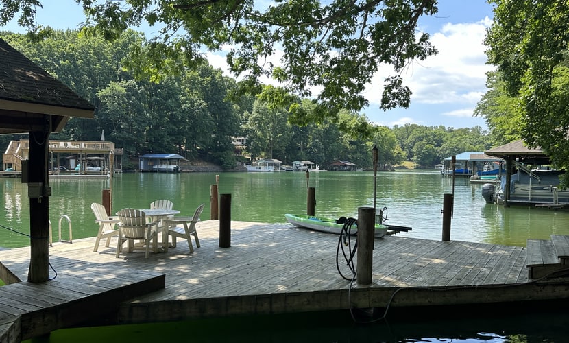 Humble Hideaway - Inviting lakefront home with firepit, balcony & W/D - dog-friendly