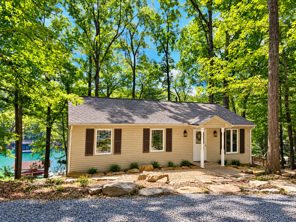 Humble Hideaway - Inviting lakefront home with firepit, balcony & W/D - dog-friendly