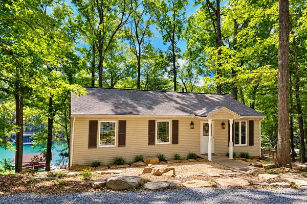 Humble Hideaway - Inviting lakefront home with firepit, balcony & W/D - dog-friendly