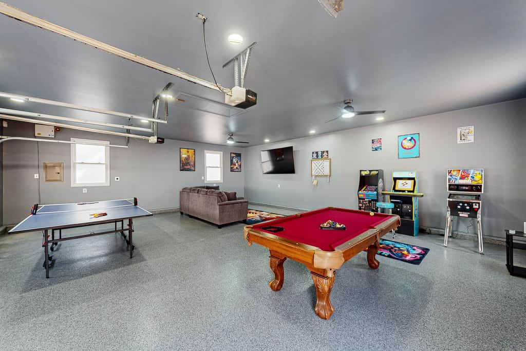 Lakefront home with two kitchens, a dock, firepit