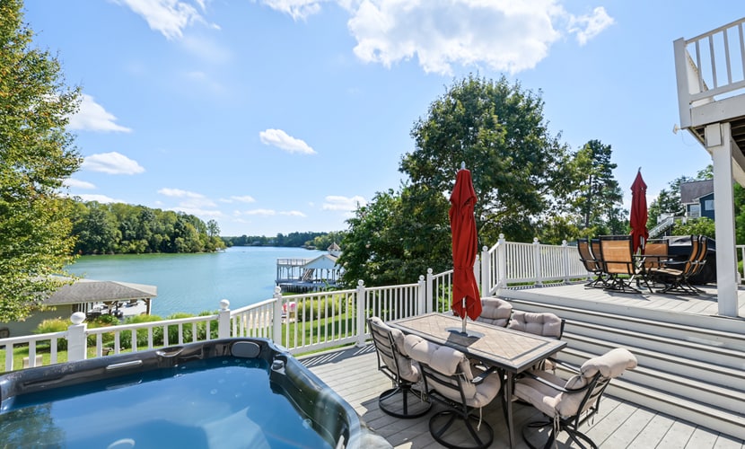 Lakefront retreat with views, hot tub, kid's play area, dock & fiber internet