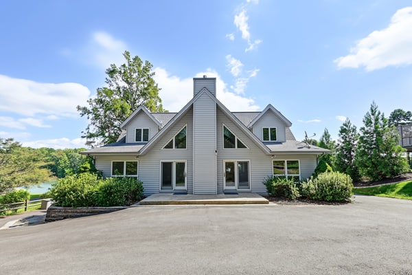 Lakefront retreat with views, hot tub, kid's play area, dock & fiber internet