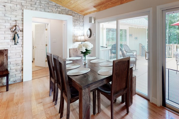 Lakefront home with luxurious finishes, granite counters, fireplace, lake views, foosball & dock