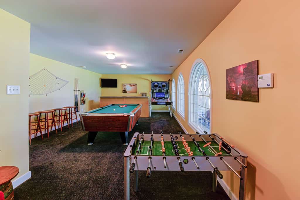 Lakefront home with boat dock, private firepit & game room - dog-friendly