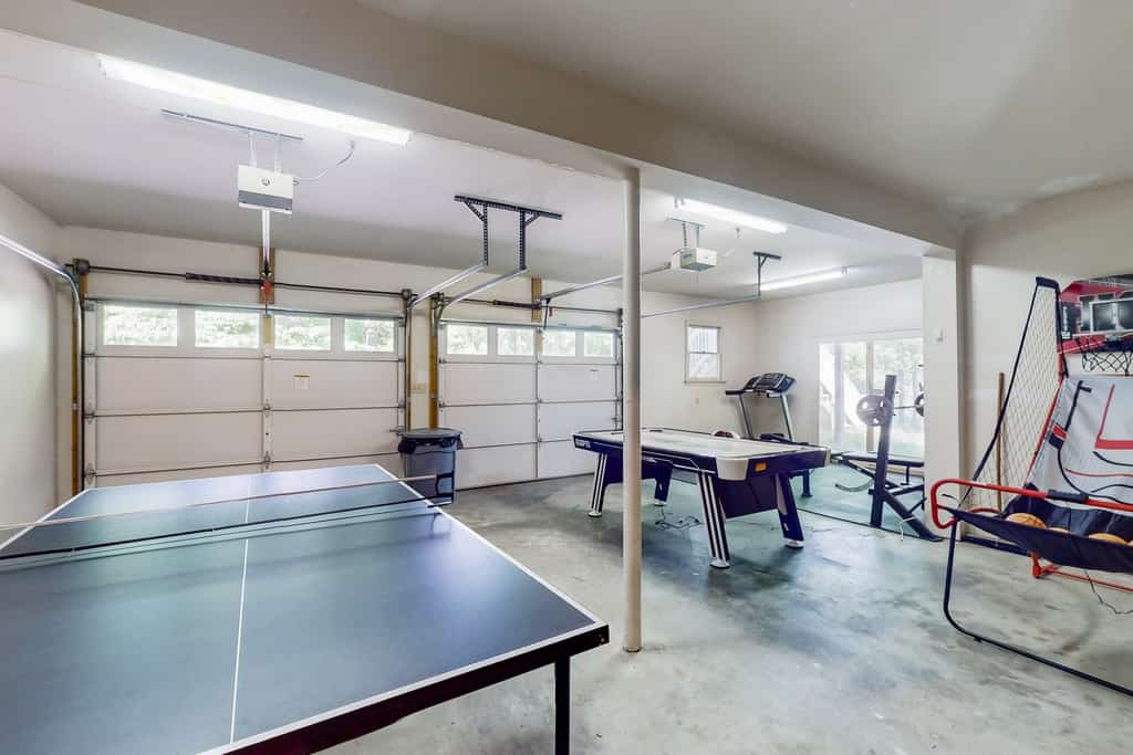 Stunning lakefront retreat w/firepit, game room, & water views