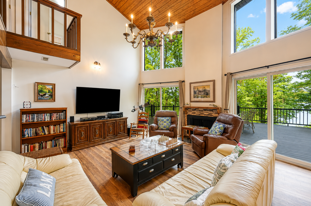Enchanting lakefront oasis with fire pit, generous patio, dock, & amazing views
