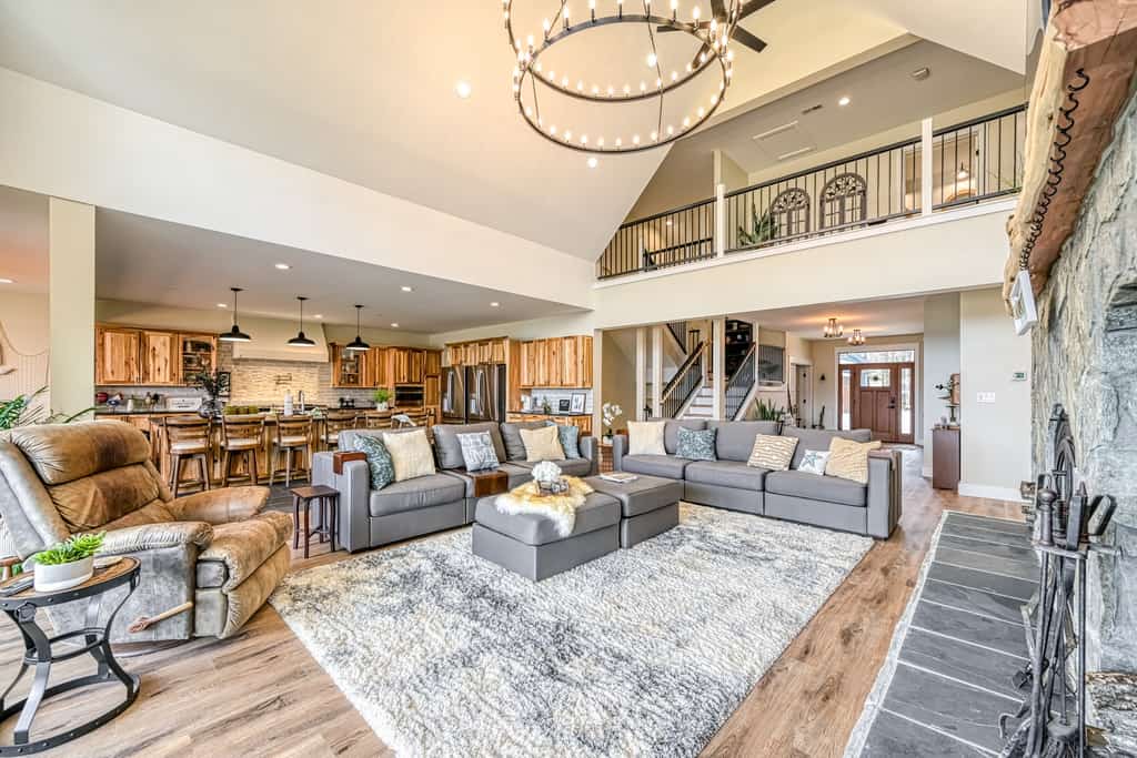Dog-friendly lakefront home with a game room, children's items, and firepit