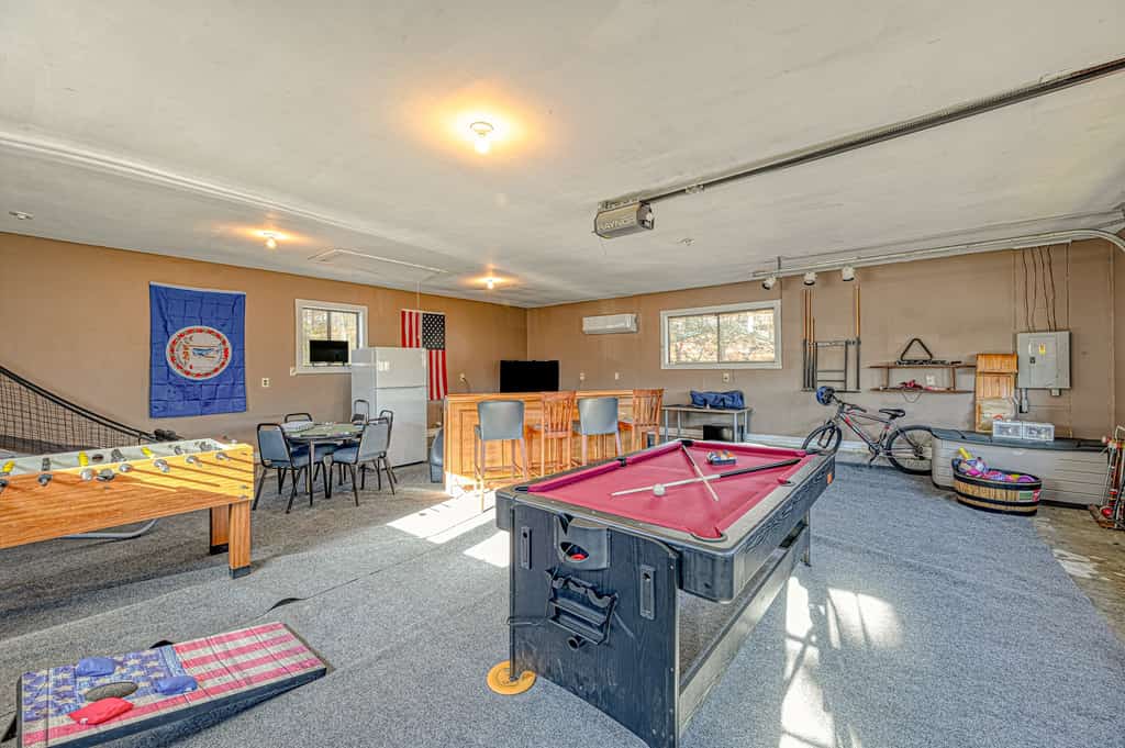 Serene lakefront home with free WiFi, private dock, game room, & central AC