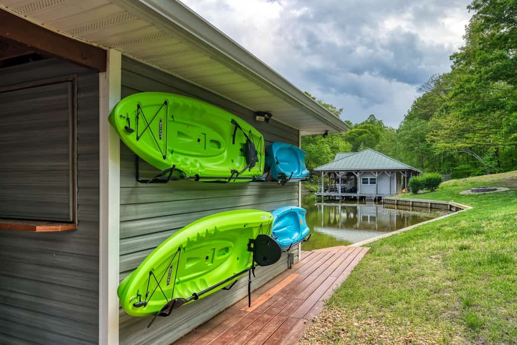 Sprawling waterfront home with kayaks, game room, and hot tub