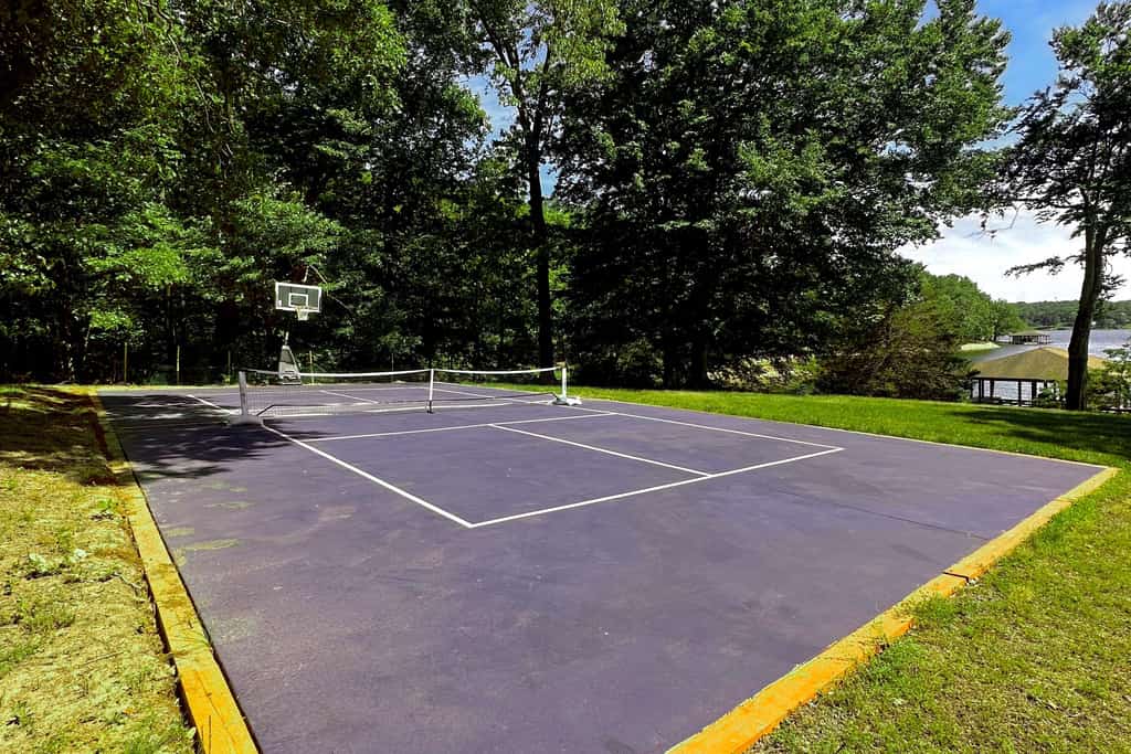 Lakefront home in private location with dock, firepit, game room & Pickleball
