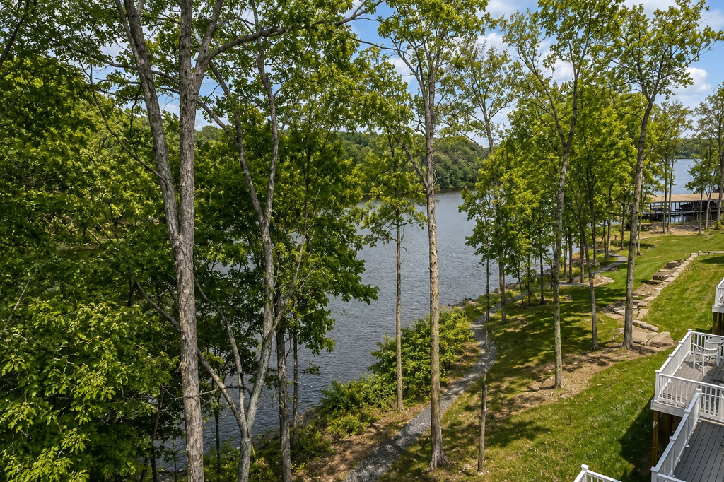 Charming lakefront retreat with game room and covered dock access