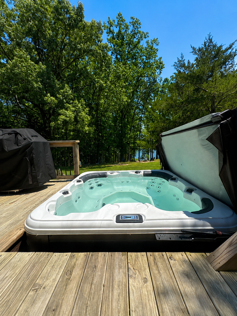 Lakefront house w/ hot tub, game room, & wood fireplace